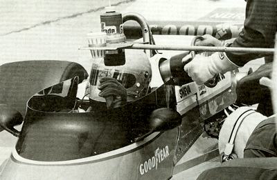 Penske's USAC driver Tom Sneva makes a pit stop at Indy in 1977